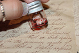 Pulled out Bloody Teeth Specimen Jar